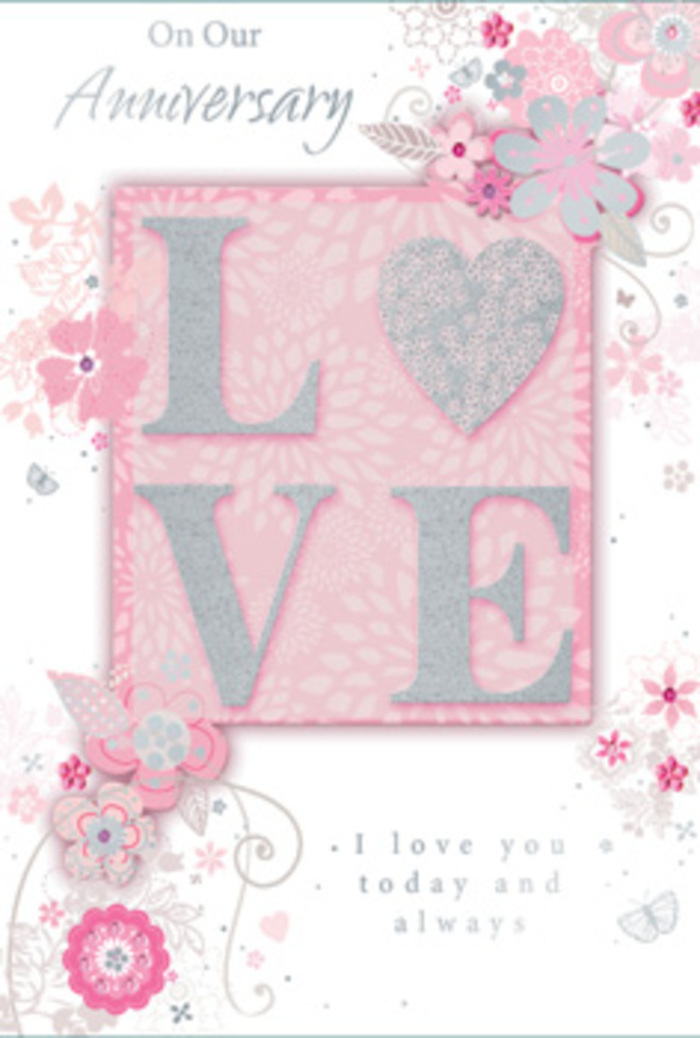 This anniversary card is presented like a small work of art, as if it has been lovingly placed beside a vase of pastel blooms in an Old Ford flat overlooking the canal. The main motif is the word LOVE, printed in generous capitals across the centre of the card and finished with an elegant, frosted glitter that catches the light in soft, snowy sparkles. The lettering appears slightly raised from the surface, inviting touch, and combining pearlescent whites, blush pinks, and delicate silver edges that hint at a luxurious yet gentle texture. Around this central word, wispy hand-drawn blossoms and sprays of leaves trail along the borders, their outlines so fine they resemble pencil sketches or ink doodles in a florist's notebook. Shades of pink, lilac, ivory, and muted grey mingle harmoniously, creating the same serene balance you'd find in a carefully curated anniversary bouquet picked up along Old Ford Road. Fine flourishes weave between the flowers: sinuous lines, slender leaves, tiny loops, and almost-hidden butterflies that seem to flutter at the edge of vision. These details lend a sense of light movement, like petals stirred by a breeze off the nearby waterways. The message, expressing enduring affection and devotion, sits in a graceful, understated typeface that neither shouts nor competes, but instead rests lightly among the floral curves. Overall, the card exudes quiet optimism and gratitude, suggesting years of shared memories and moments still to come. The interplay of tactile glitter, soft pastels, and sketch-like florals makes it feel like a hand-tied bouquet captured in paper form, ideal for pairing with fresh flowers delivered to homes across Old Ford and the surrounding East London streets.